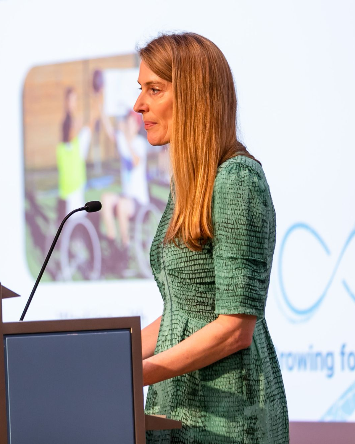 Liz Nieboer speaking at an event